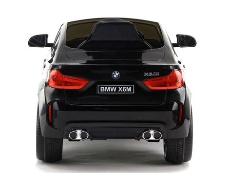 Interjeras vaikiško elektromobilio BMW X6M su muzikos sistema ir AUX jungtimi