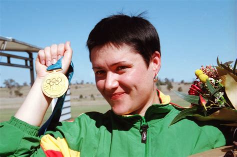 Daina Gudzinevičiūtė su olimpiniu aukso medaliu