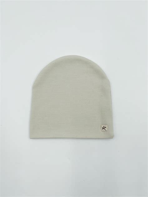 Naujagimio kepuraitė iš merino vilnos