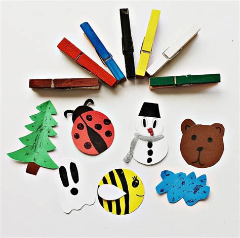 vaikas naudoja skalbinių segtukus