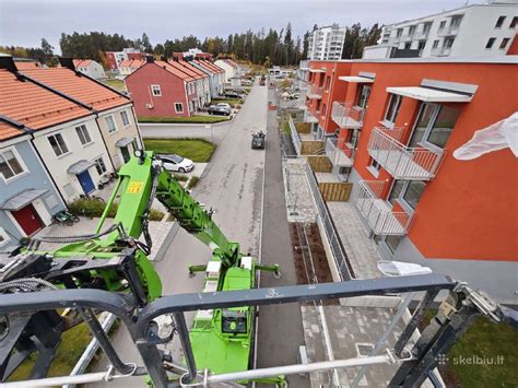 Statybininkai, dirbantys Švedijoje