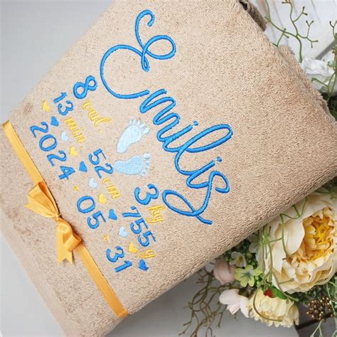 Siuvinėtas naujagimio metrikas