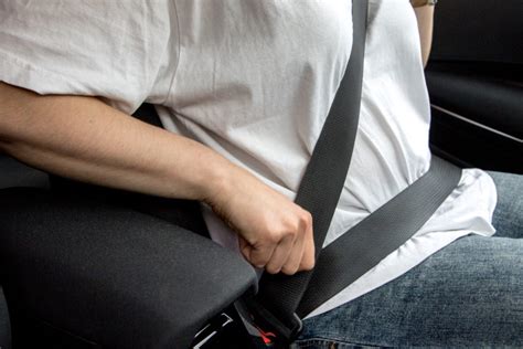 Saugos diržų sistema automobilinėje kėdutėje