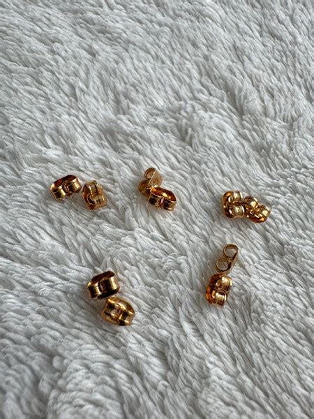 įvairūs auskarų užsegimai