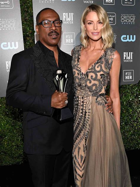 Eddie Murphy su vaikais ir partnere Paige Butcher