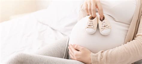 Moteris su gydytoju aptaria nėštumo eigą