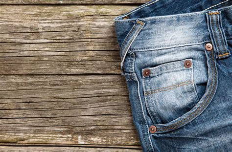 Termo džinsų nuotrauka su įvairiomis detalėmis