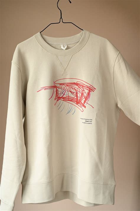 Talpios kišenės ant džemperio