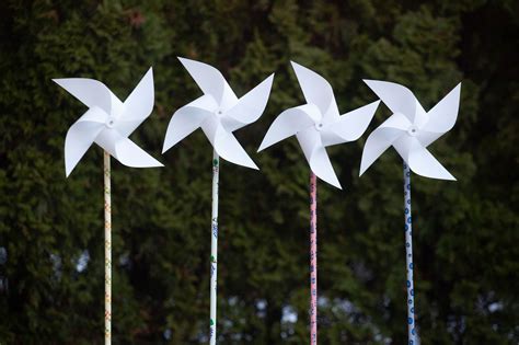 Vėjo malūnėliai kaip krikštynų puošybos elementai