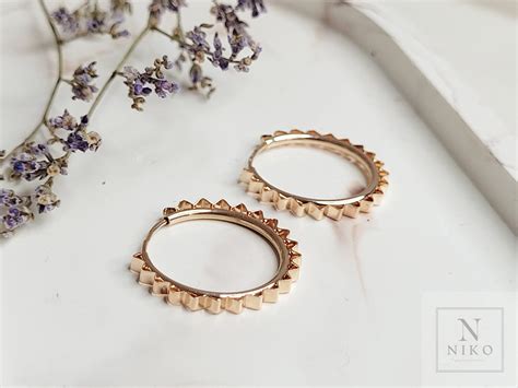 Auksiniai papuošalai krikštynoms