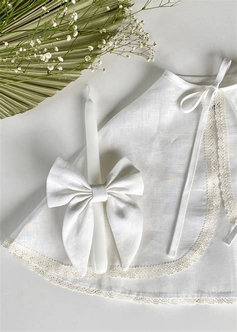 Krikšto žvakės ir rūbelio simbolika