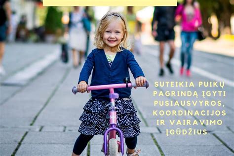 vaikas ant balansinio dviratuko