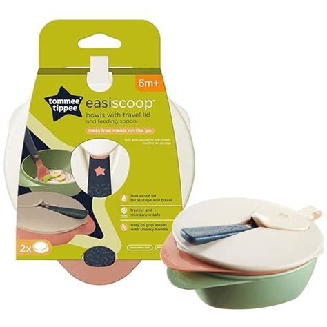 Vaikas valgo iš Easi-Scoop dubenėlio su Tommee Tippee šaukšteliu