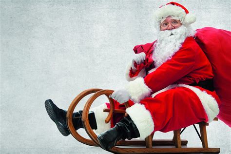 Kalėdų Senelis su maišu dovanų