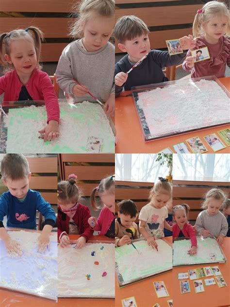 vaikų grupė žaidžianti su šviesos stalu