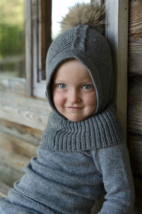 Vaiko nuotrauka su merino vilnos pledeliu