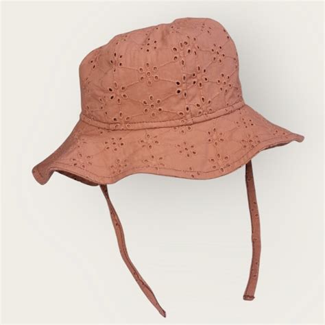 Vasarinių kepurių kūdikiams apsauga nuo saulės