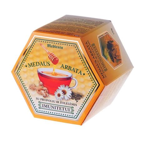 Medaus stiklainis ir arbata