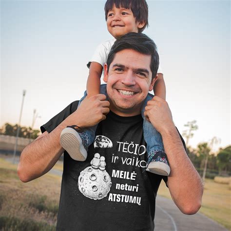 Vaiko ir tėčio apkabinimas