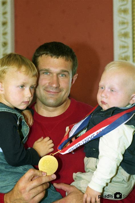 Virgilijus Alekna su sūnumis Mykolu ir Martynu