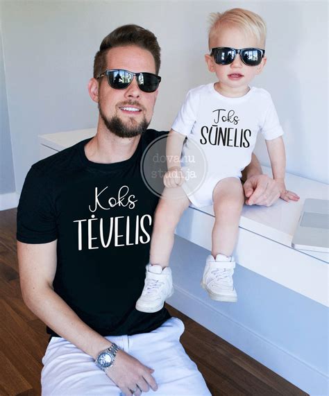 Simbolinis paveikslas: tėtis ir vaikas