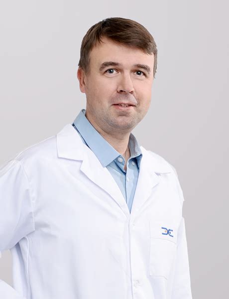 gydytojas Vilius Rudaitis konsultuoja pacientę
