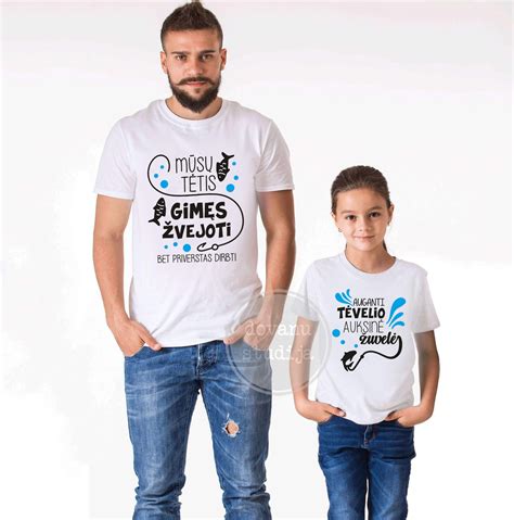 Tėtis glaudžia naujagimį