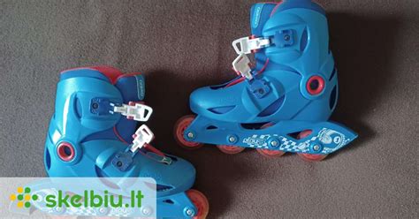 vaikai slidinėjantys su apsaugomis veidui