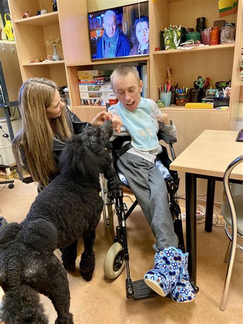 terapinis šuo su vaiku