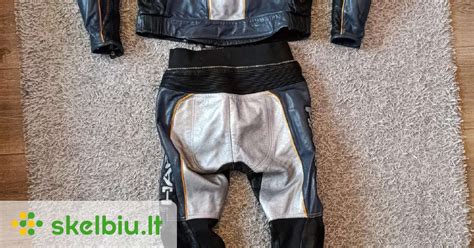 vaikiškas motociklininko šalmas ir apranga