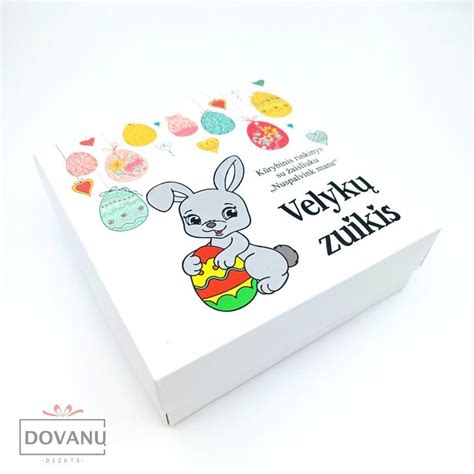 Juokingas Velykų zuikis su margučiais