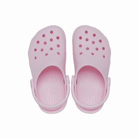 Vaikiškos Crocs klumpės paplūdimyje